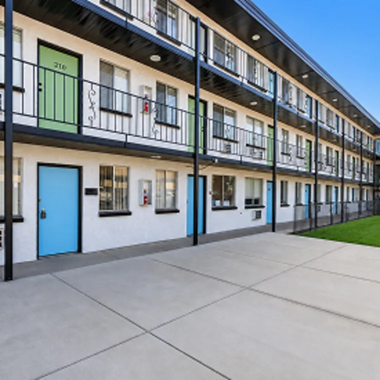 Lost Creek Apartments exterior courtyard with apartment entries